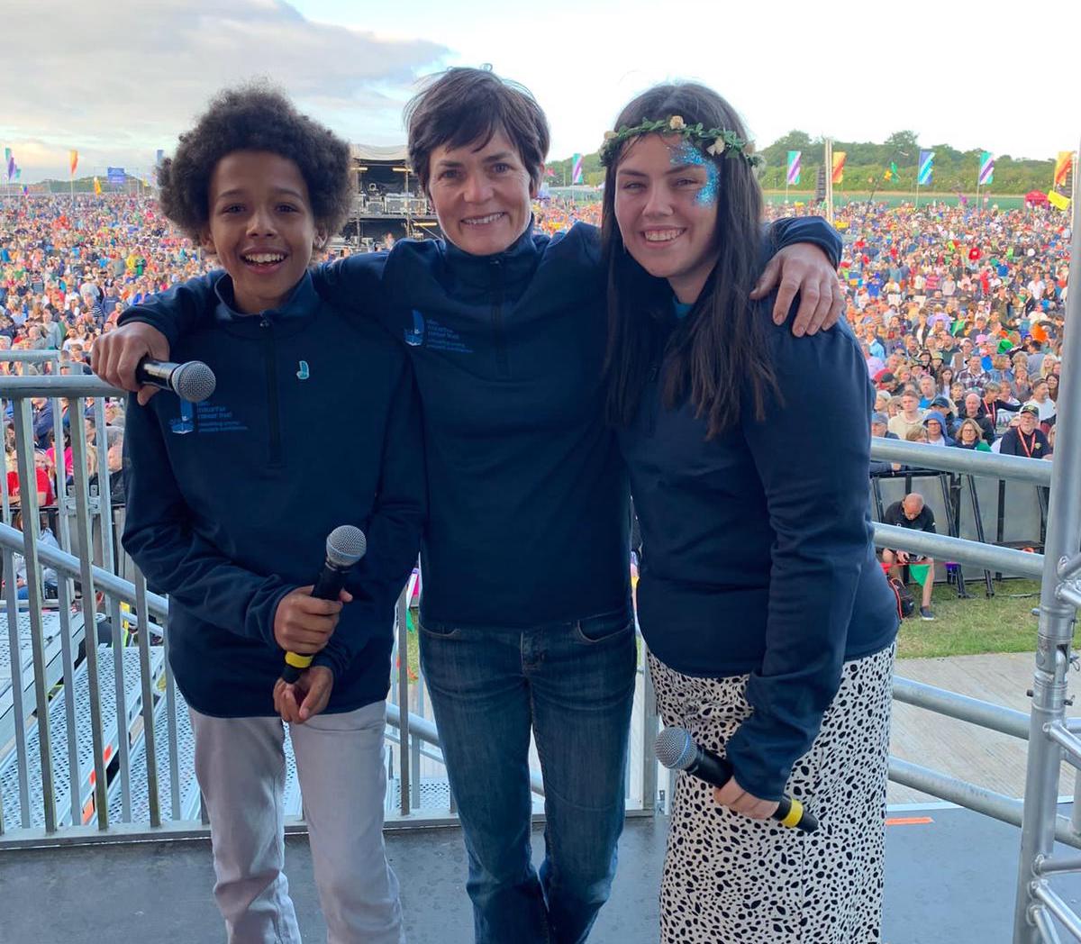 Ellen MacArthur with young person Emmanuel and volunteer Macy at 2021 CarFest South
