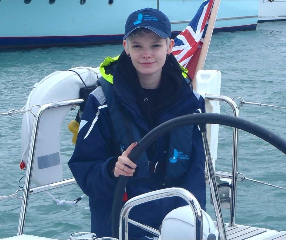 Emily page helming on her first Trust trip in 2017