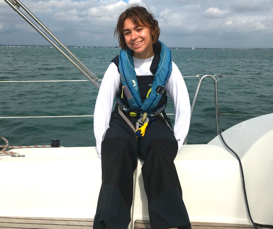 Isla looking happy with a big smile during her last Trust sailing trip in 2022