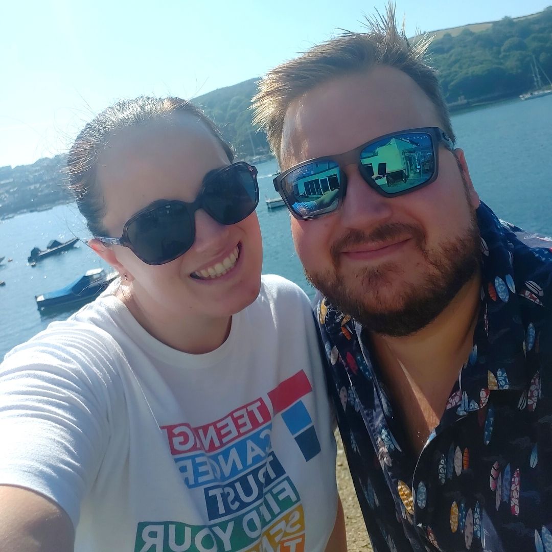 Becca and her partner taking a selfie on a trip to cornwall