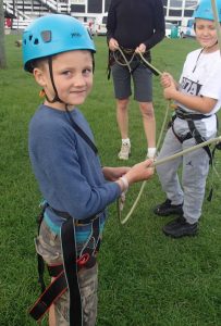 Ashan Molligoda straps up for the high ropes on the siblings trip to Bradwell 2018